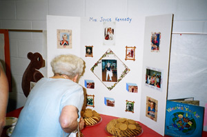 Betty looks at the photos